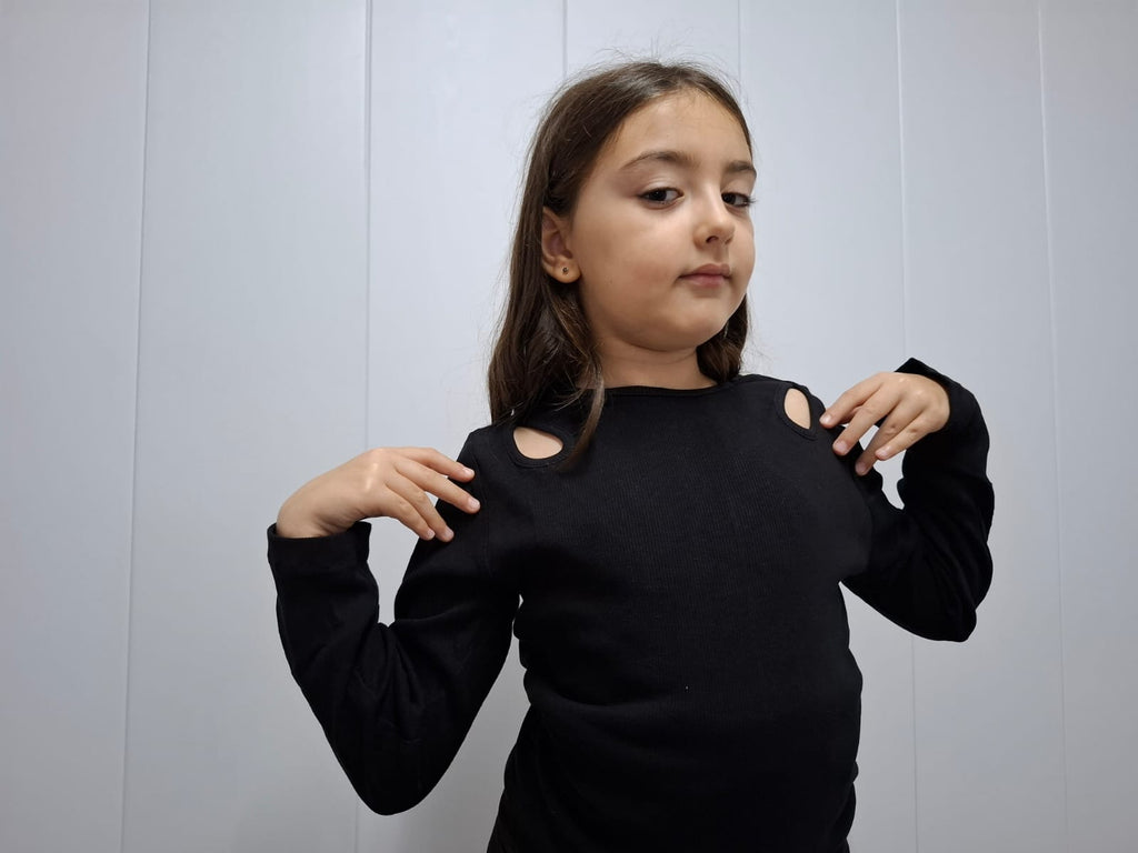 Modern Edge: Black Ribbed Top with Shoulder Cut-Outs