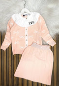 The Bow-Knit Cardigan & Pleated Skirt Set: Timeless Charm