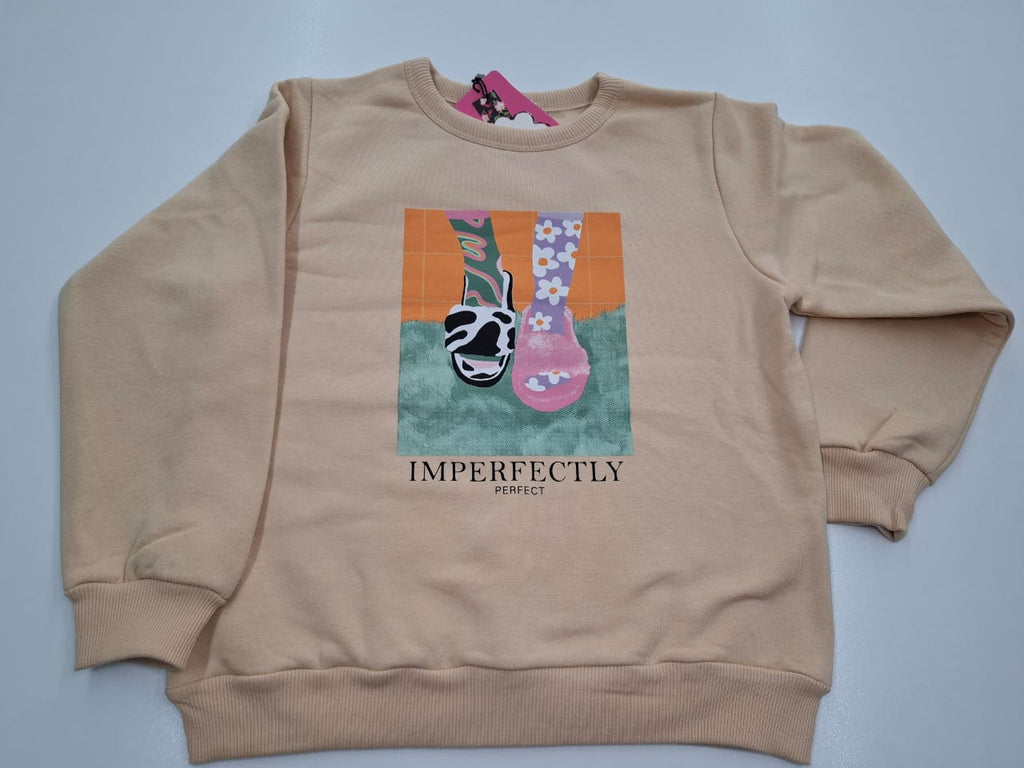 Graphic Statement: The Perfectly Imperfect Oversized Sweatshirt