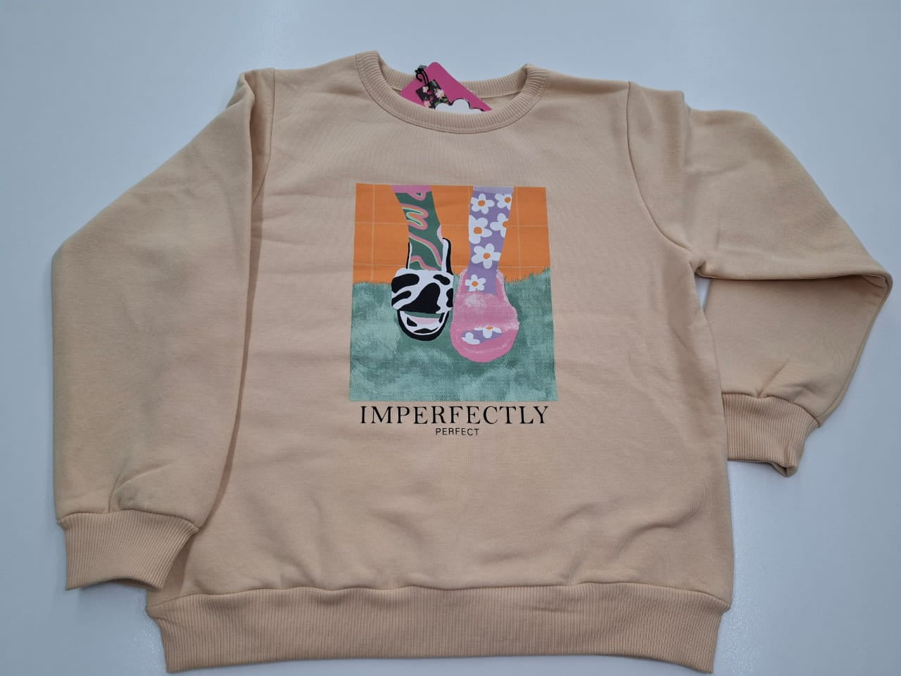 Graphic Statement: The Perfectly Imperfect Oversized Sweatshirt