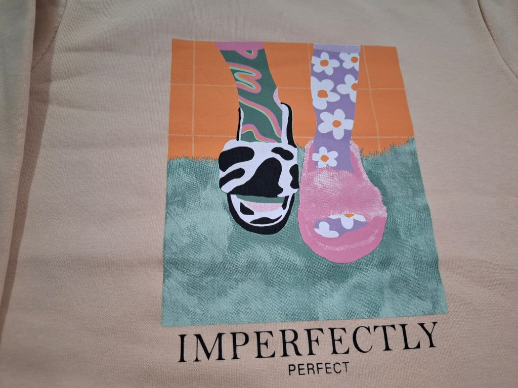 Graphic Statement: The Perfectly Imperfect Oversized Sweatshirt