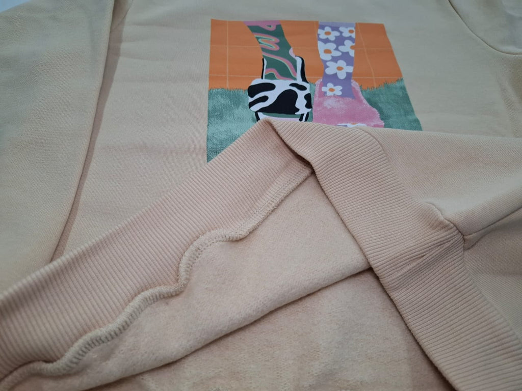 Graphic Statement: The Perfectly Imperfect Oversized Sweatshirt