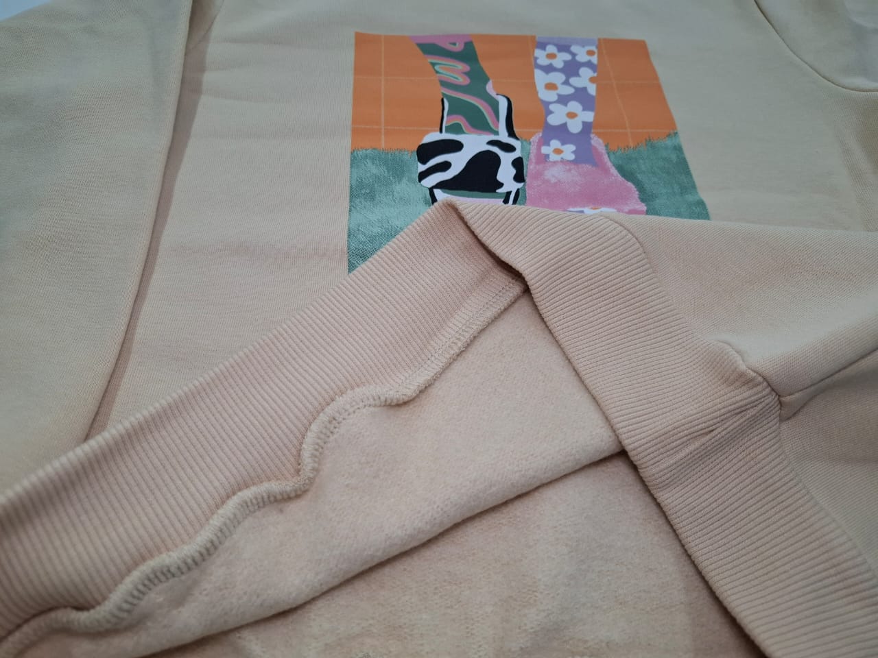 Graphic Statement: The Perfectly Imperfect Oversized Sweatshirt